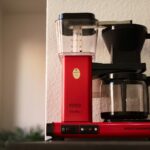red and black coffee maker