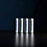 a group of three batteries sitting on top of a table